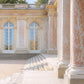 Elegant marble columns and arched windows of a French Rococo palace exterior inspired by the Grand Trianon at Versailles, warm stone tones and classical architecture in soft natural light