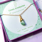 Laganna handmade green aventurine irregular stone gold necklace for luck, wealth and success displayed in purple Laganna box