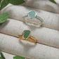Handmade green aventurine irregular stone rings in gold and silver wire wrapped designs featuring natural healing crystal jewelry crafted by Sri Lankan artisans as luck stone rings and heart chakra balancing amulets for women seeking prosperity and abundance with raw gemstone energy