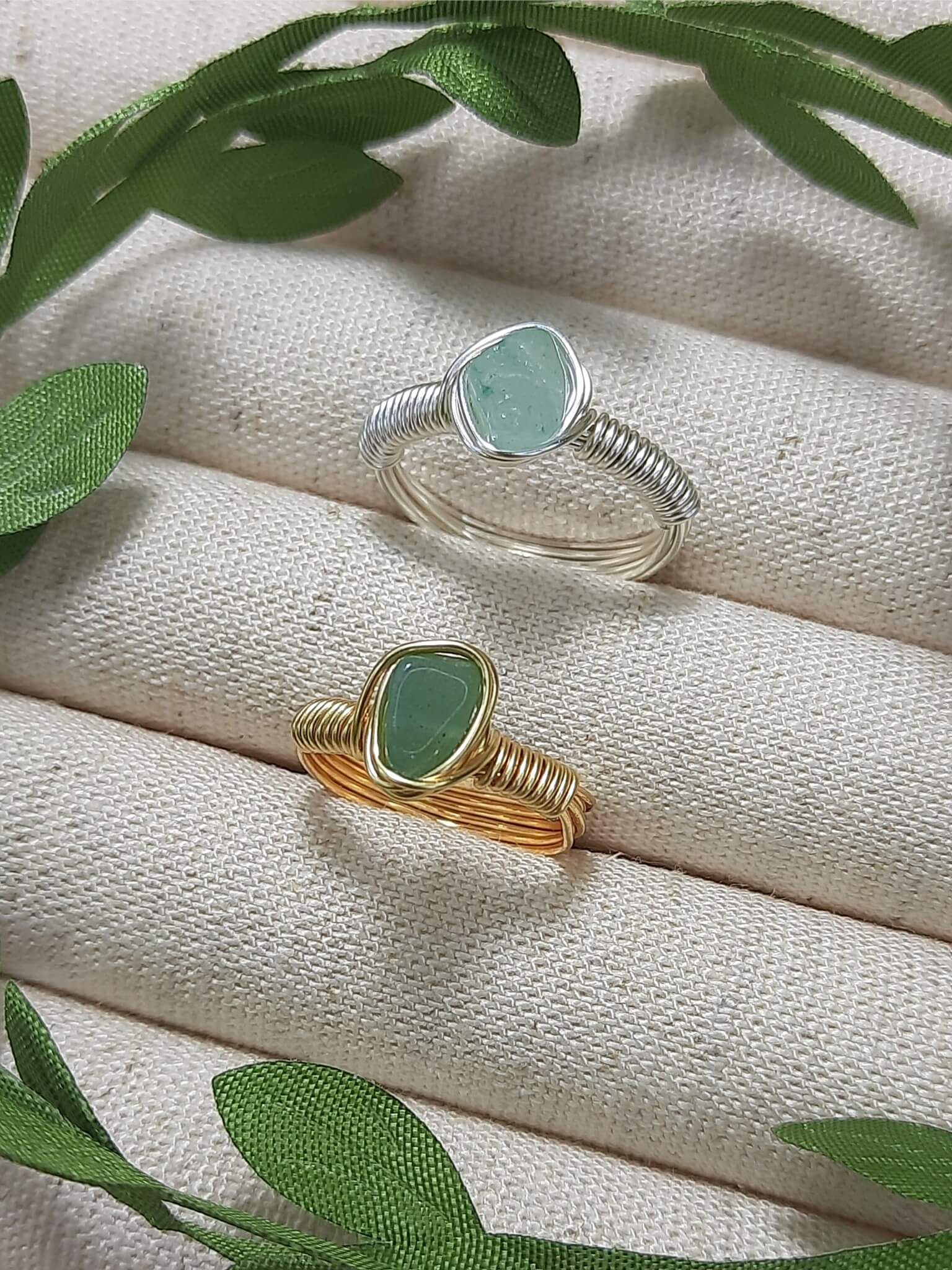 Handmade green aventurine irregular stone rings in gold and silver wire wrapped designs featuring natural healing crystal jewelry crafted by Sri Lankan artisans as luck stone rings and heart chakra balancing amulets for women seeking prosperity and abundance with raw gemstone energy