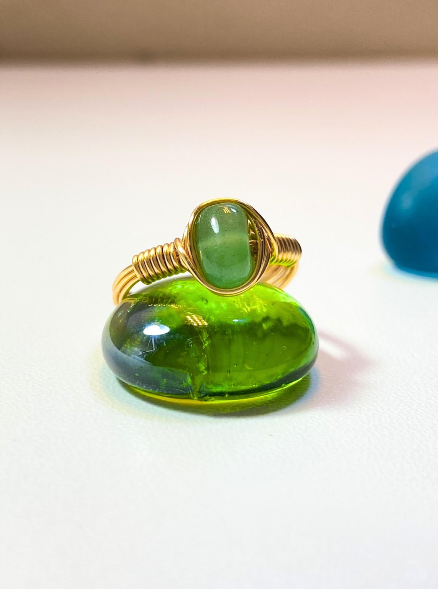  Natural green aventurine irregular stone ring close-up detail showing handmade gold wire wrapped healing crystal jewelry, Sri Lankan artisan crafted luck stone ring with raw gemstone perfect as boho prosperity ring and heart chakra amulet for abundance and emotional healing