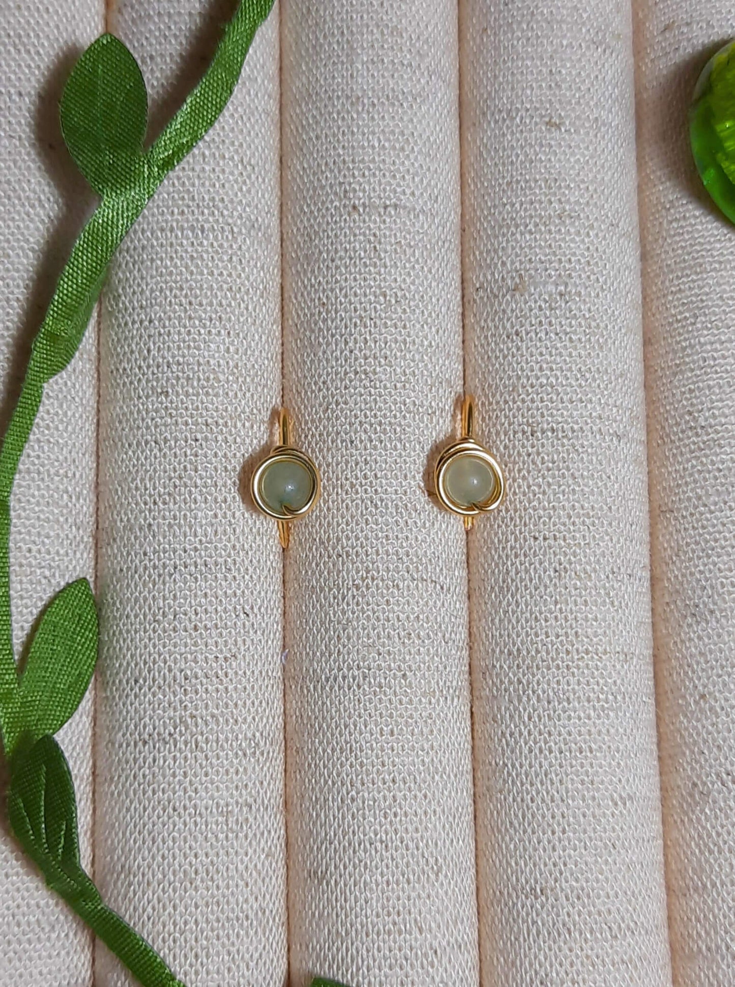Green Aventurine Mini Round Stud Earrings packaging with crystal meaning card - handcrafted wire-wrapped healing jewelry gift from Sri Lanka featuring natural green aventurine stone for luck, wealth, and success
