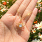 Elegant blue chalcedony star necklace displayed on hand, highlighting the celestial minimalist gold wire wrapped pendant - handmade healing crystal jewelry from Sri Lanka for calming energy and hope