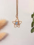 Heavenly Blue Star Necklace with Blue Chalcedony stone cradled in a gold wire star pendant, handmade healing crystal necklace for calm and clarity, Laganna Sri Lanka
