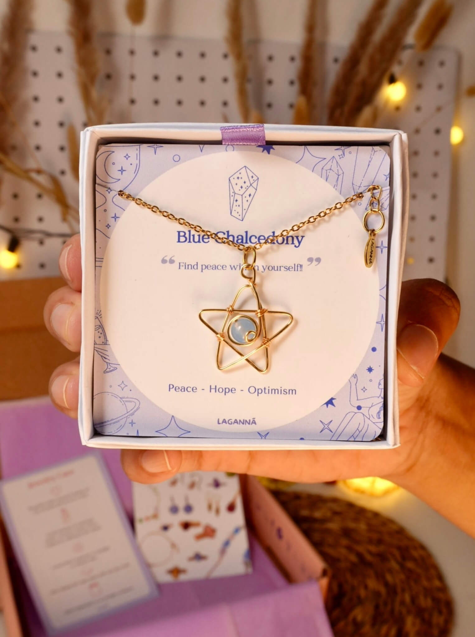 Heavenly Blue Star Necklace with Blue Chalcedony in Laganna gift box with crystal meaning card showing Peace Hope Optimism, handmade healing crystal necklace for calm and clarity, Sri Lanka