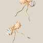 Japanese Miyuki Delica bow earrings on white background, handmade wire-wrapped stud earrings with premium glass beads in cream white and powder blue, artisan jewelry Sri Lanka by Laganna, delicate feminine bow design for everyday wear