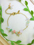 Handmade Joseon Palace Bracelet featuring wire-wrapped healing crystals including rose quartz, green aventurine, and aquamarine, inspired by Korean Gyeongbokgung Palace and historical K-drama elegance, artisan jewellery crafted in Sri Lanka