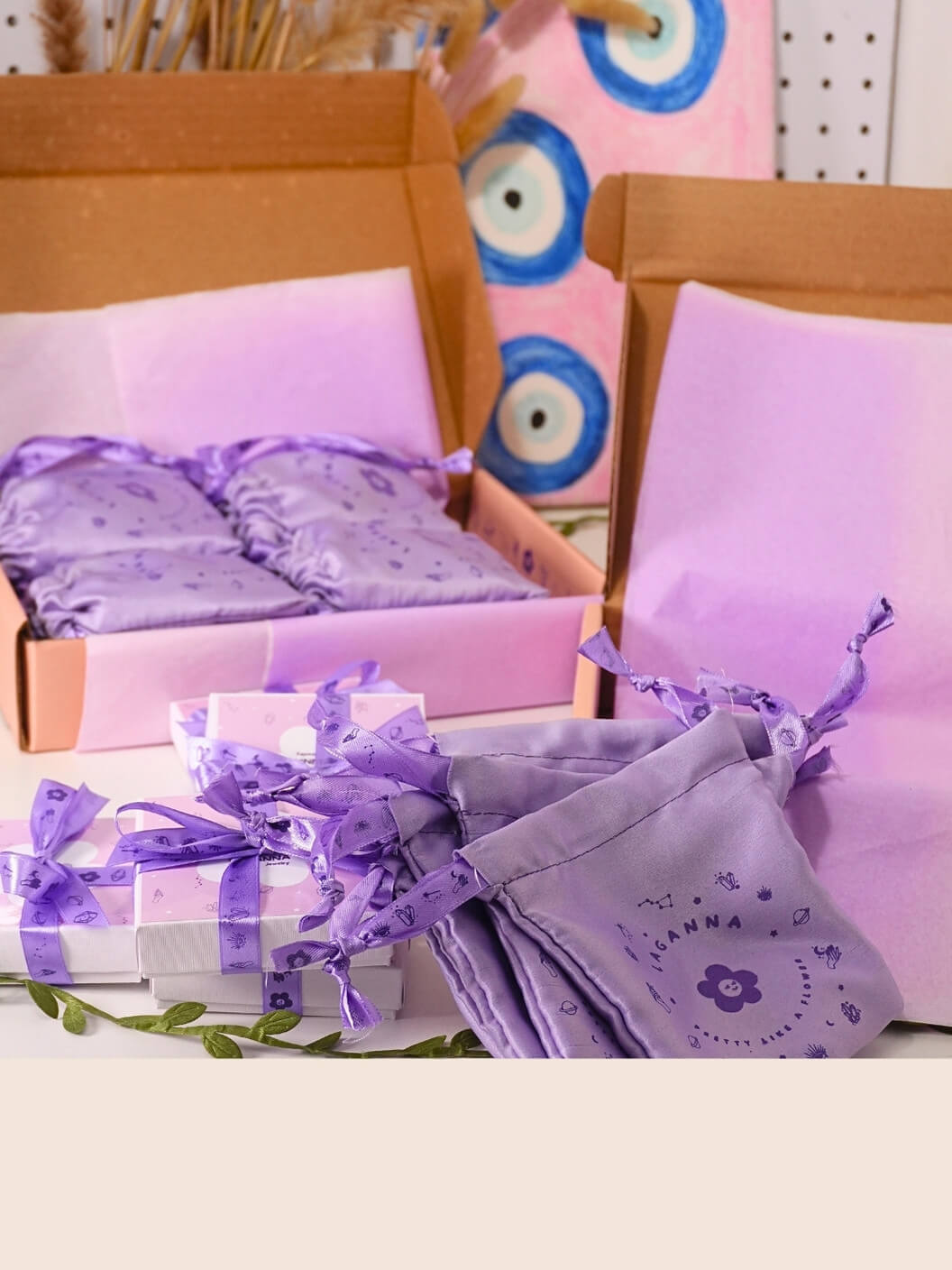 Laganna jewelry packaging with ribbons in a box on a white surface