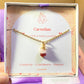 Love Duo irregular stone necklace jewelry box held on hand showing rose quartz and carnelian, handmade Sri Lankan gold wire wrapped dual crystal pendant gift for emotional healing