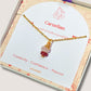 Laganna handmade Love Duo irregular stone necklace with rose quartz and carnelian for love and confidence displayed in Laganna jewelry box

