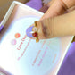  Love Duo ring with rose quartz and carnelian held on hand, handmade Sri Lankan gold wire wrapped dual crystal ring for self-love and creative energy