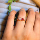 Love Duo ring with rose quartz and carnelian worn on hand, handmade Sri Lankan gold wire wrapped dual stone ring lifestyle for heart chakra and sacral chakra