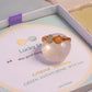Lucky Duo Ring Green Aventurine and Citrine gold wire infinity wrapped displayed on rose quartz sphere Laganna gift box, handmade healing crystal ring Sri Lanka Laganna
