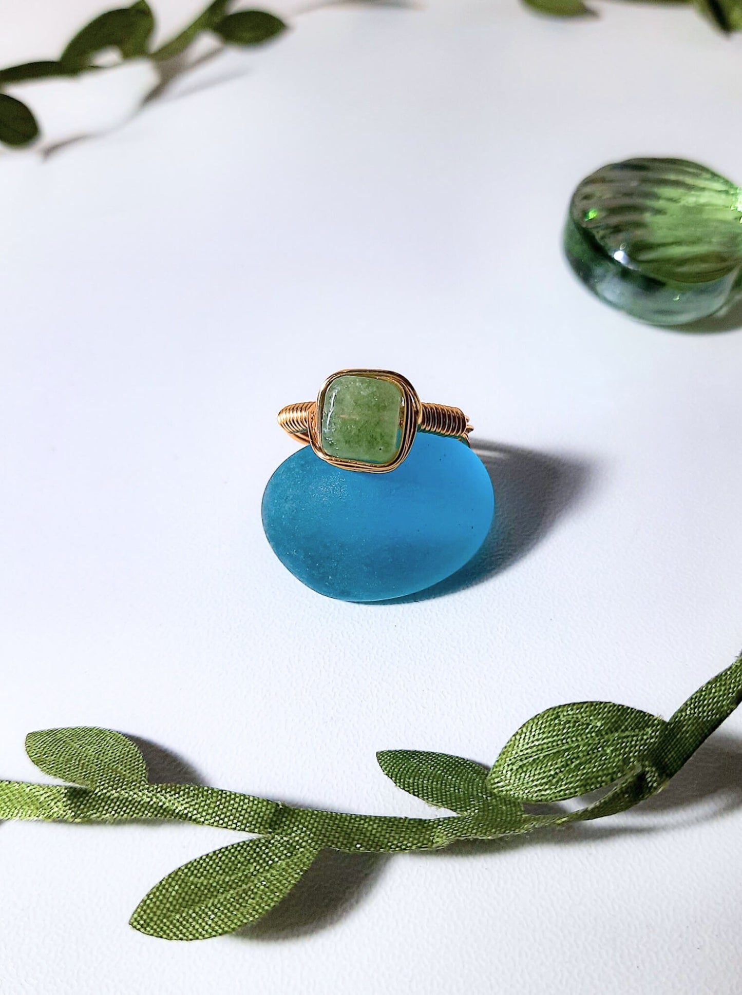 Olive jade square stone ring with gold wire wrapped design, handmade Sri Lankan heart chakra jewelry featuring natural green gemstone for prosperity and emotional healing