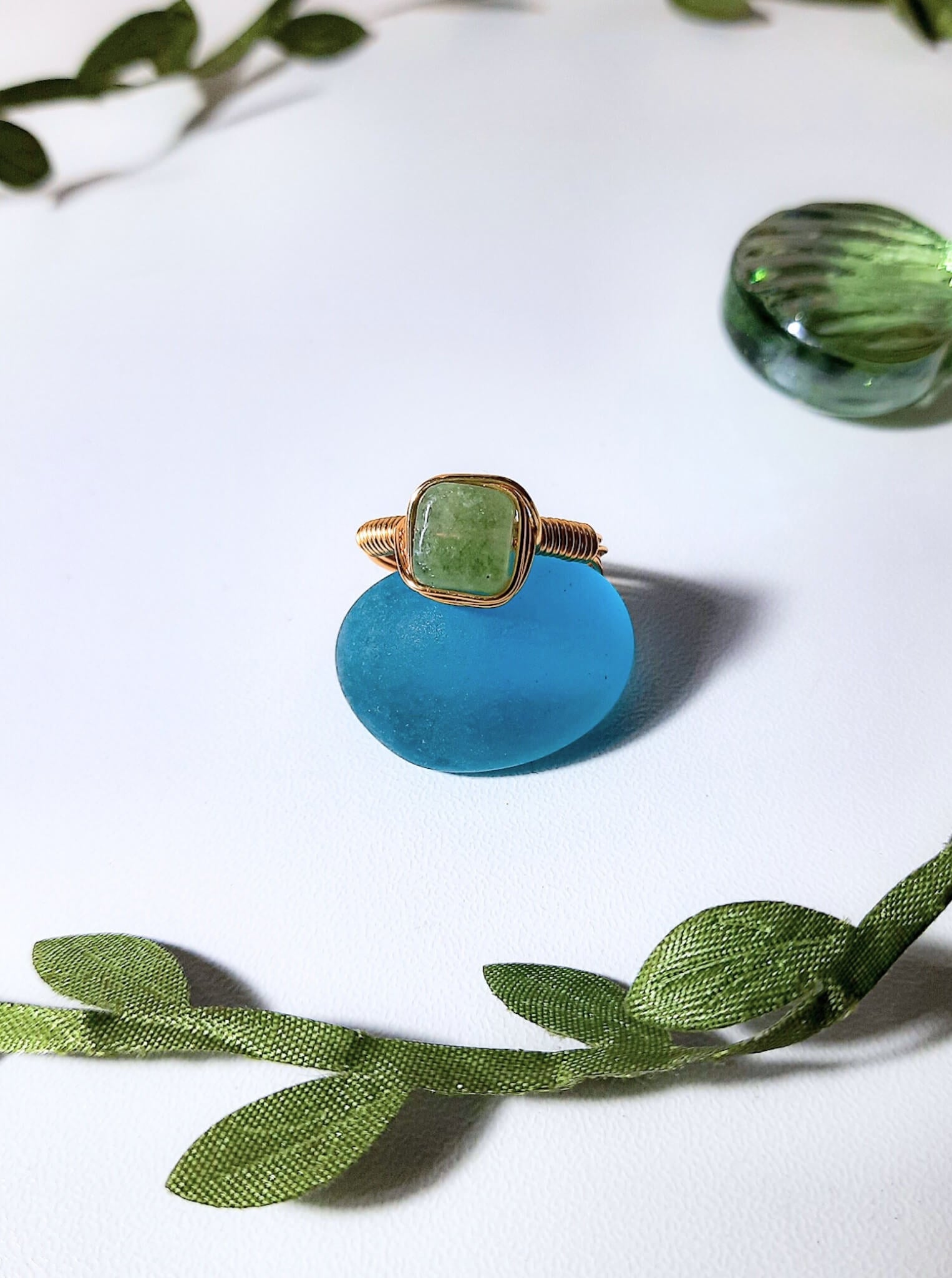 Olive jade square stone ring with gold wire wrapped design, handmade Sri Lankan heart chakra jewelry featuring natural green gemstone for prosperity and emotional healing