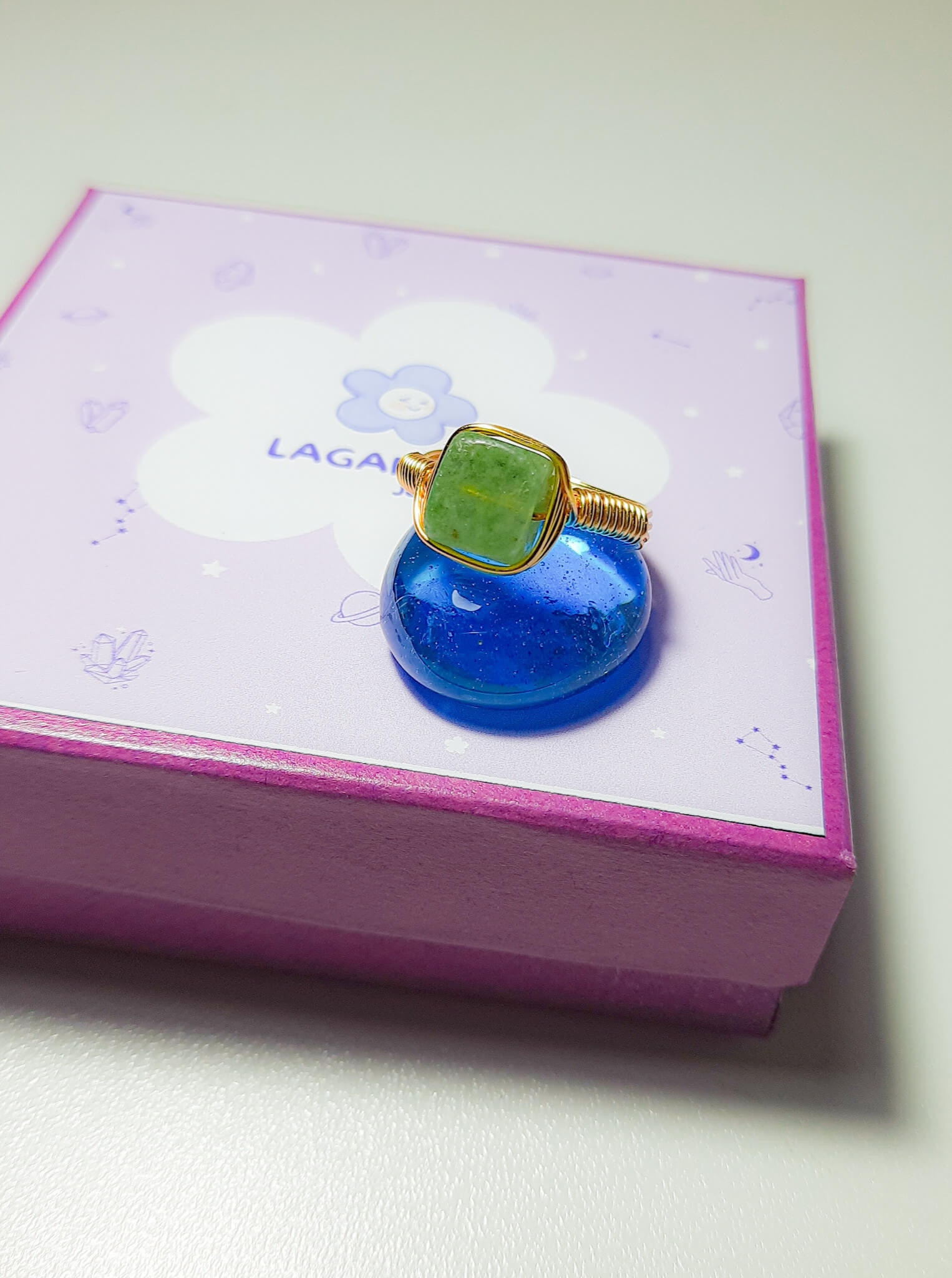 Natural olive jade square stone ring in elegant jewelry box, handmade gold wire wrapped healing crystal gift set from Sri Lankan artisans for abundance and spiritual growth