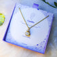 Opalite square stone necklace in gold wire wrap with jewelry box aesthetic styling, handmade Sri Lankan healing crystal pendant for intuition and inner peace