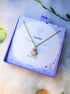 Opalite square stone necklace in gold wire wrap with jewelry box aesthetic styling, handmade Sri Lankan healing crystal pendant for intuition and inner peace