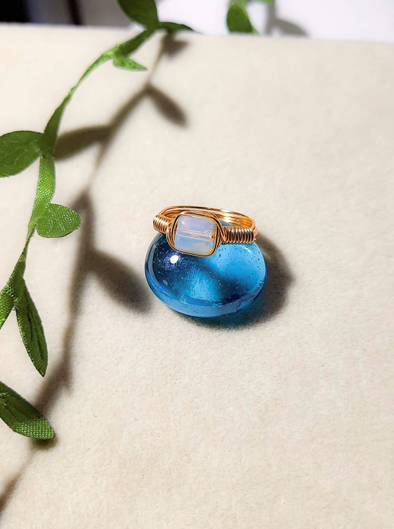 Opalite square stone ring with aesthetic styling, handmade Sri Lankan gold wire wrapped healing crystal ring for crown chakra and spiritual growth