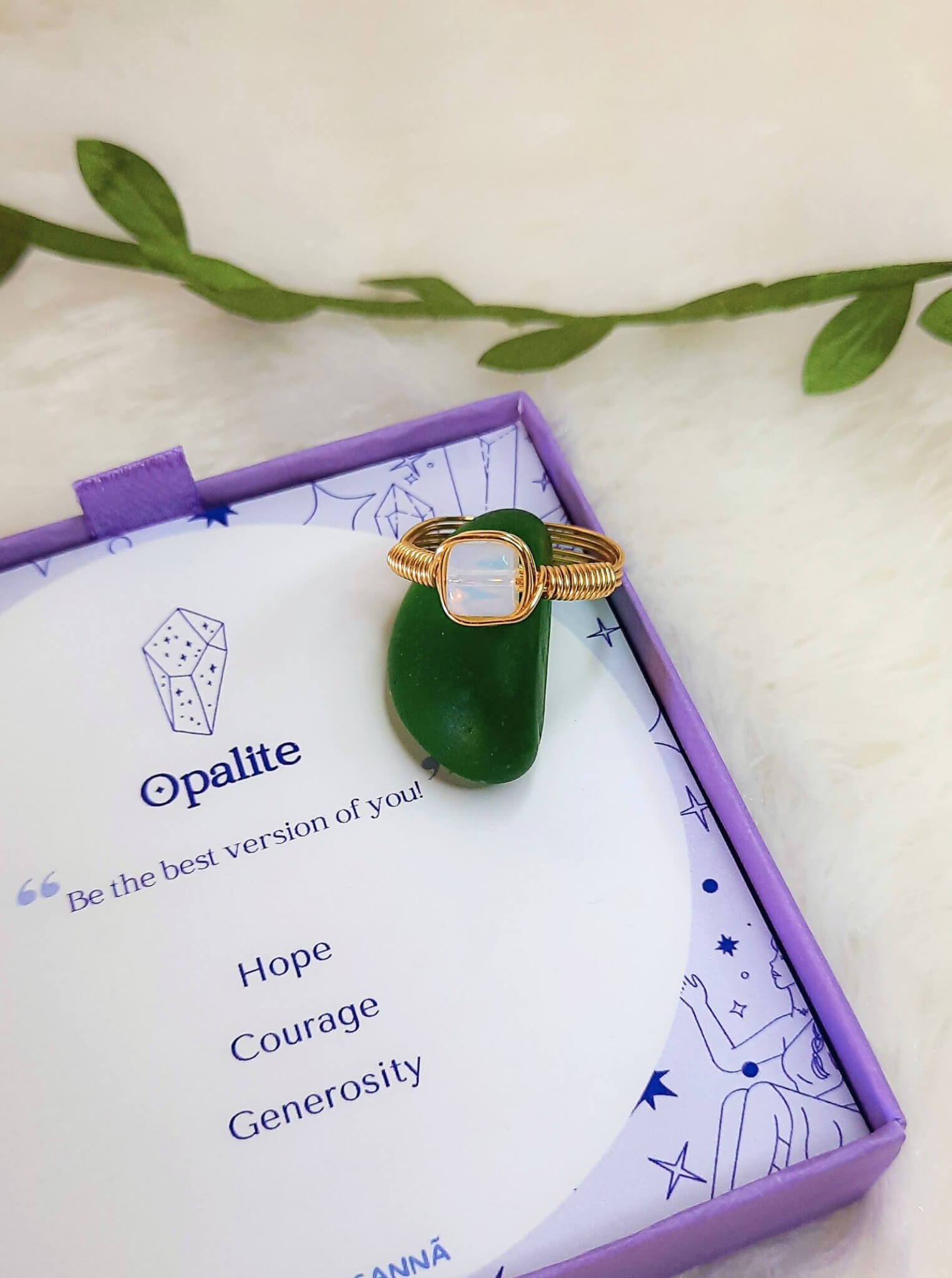 palite square stone ring in gold wire wrap with jewelry box aesthetic styling, handmade Sri Lankan healing crystal ring for crown chakra and spiritual clarity