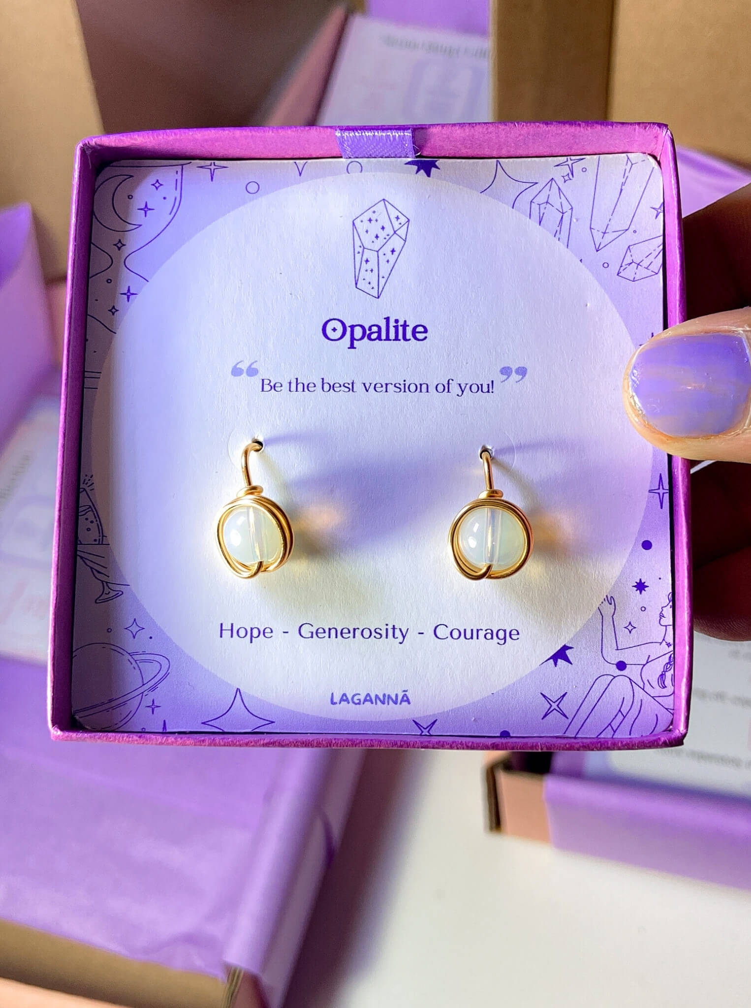 Opalite Statement Round Stud Earrings packaging with crystal meaning card - handcrafted wire-wrapped healing jewelry gift from Sri Lanka featuring natural opalite stone for hope, resilience, and inner light