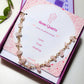 Petal of Love Rose Quartz Bracelet in elegant gold wire wrap presented in luxury jewelry box packaging, handmade in Sri Lanka