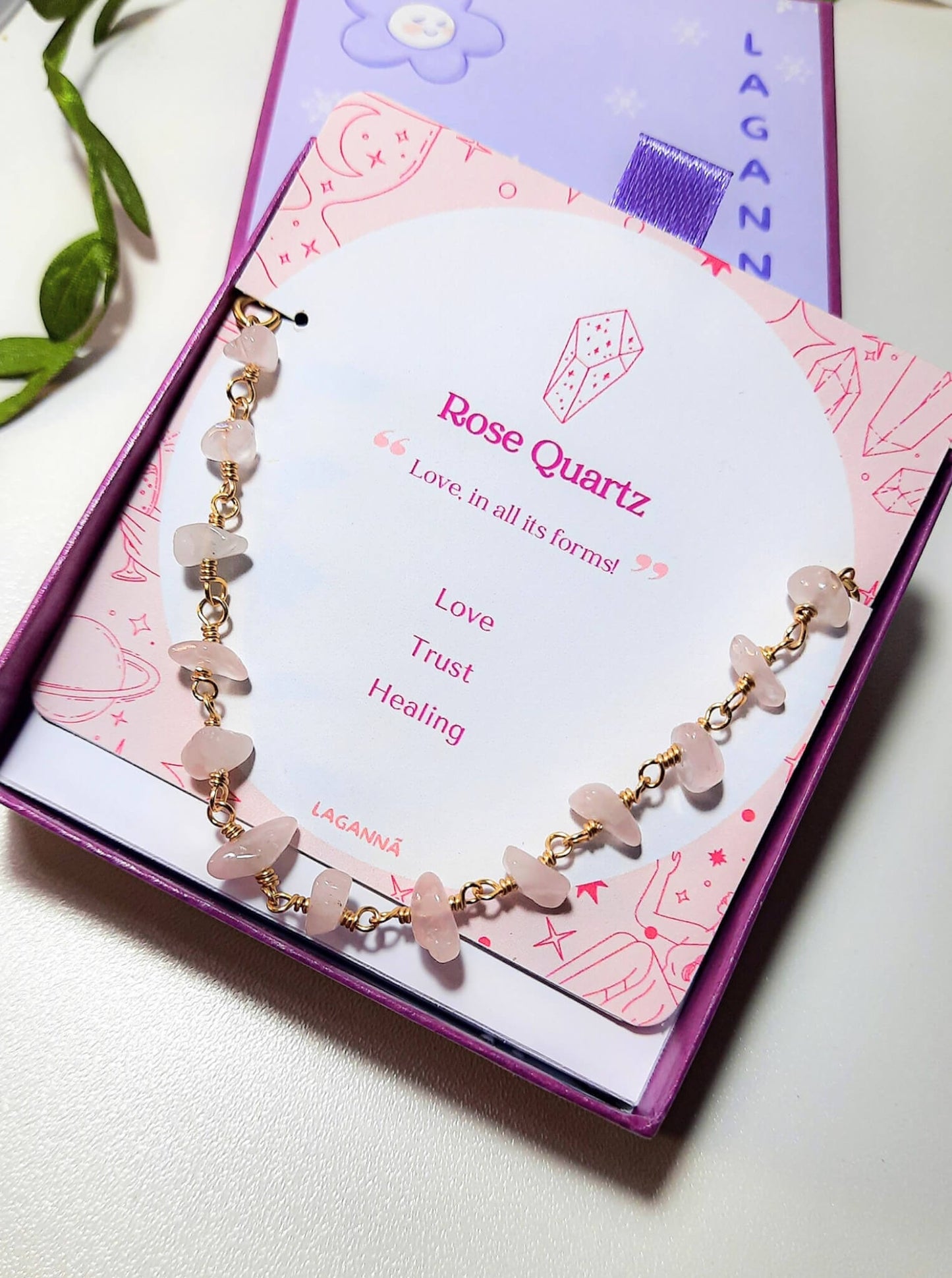 Petal of Love Rose Quartz Bracelet in elegant gold wire wrap presented in luxury jewelry box packaging, handmade in Sri Lanka