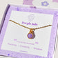 Beautiful purple jade petite round pendant necklace on clean white background with jewelry box, featuring delicate gold wire wrapping - artisan-crafted healing crystal jewelry handmade in Sri Lanka for positivity and joy