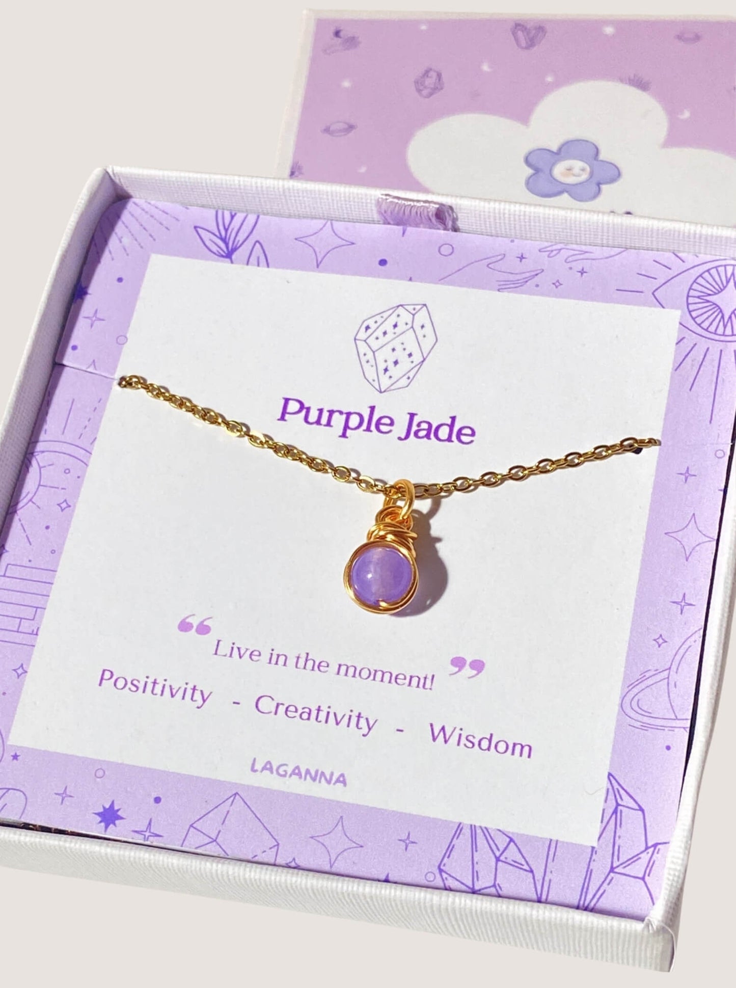 Beautiful purple jade petite round pendant necklace on clean white background with jewelry box, featuring delicate gold wire wrapping - artisan-crafted healing crystal jewelry handmade in Sri Lanka for positivity and joy