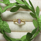 Purple jade irregular stone ring on jewelry display showing handmade gold wire wrapped healing crystal jewelry, Sri Lankan artisan wisdom stone ring featuring natural purple gemstone perfect as boho spiritual ring and crown chakra amulet for meditation and enlightenment energy