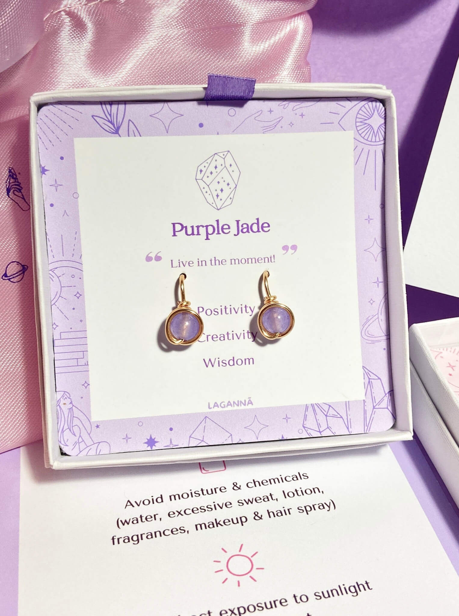 Purple Jade Petite Round Stud Earrings lifestyle shot with elegant packaging and care instructions - handmade crystal healing jewelry from Sri Lanka, perfect gift for mindful living and emotional balance