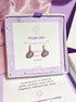 Purple Jade Petite Round Stud Earrings lifestyle shot with elegant packaging and care instructions - handmade crystal healing jewelry from Sri Lanka, perfect gift for mindful living and emotional balance