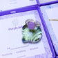Purple jade square stone ring in silver wire wrapped design in jewelry box showing handmade healing crystal gift set, Sri Lankan artisan crown chakra ring featuring natural square purple gemstone perfect as wisdom jewelry gift for spiritual awakening and inner peace with elegant presentation