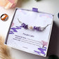Purple Lake Bracelet amethyst freshwater pearl purple jade silver wire wrapped in Laganna jewelry box overhead flat lay with pampas grass styling, handmade healing crystal bracelet Sri Lanka – purity inner peace emotional healing
