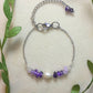 Purple Lake Bracelet in silver wire wrap featuring amethyst and purple crystals with water-inspired palette, handmade jewelry from Sri Lanka