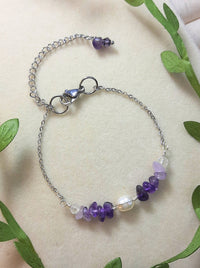 Side view of Purple Lake Bracelet showing silver wire wrapped purple crystals and amethyst stones in serene lake-inspired design, handmade in Sri Lanka