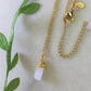 Rose quartz irregular stone necklace with aesthetic styling, handmade Sri Lankan gold wire wrapped healing crystal pendant for love and emotional balance