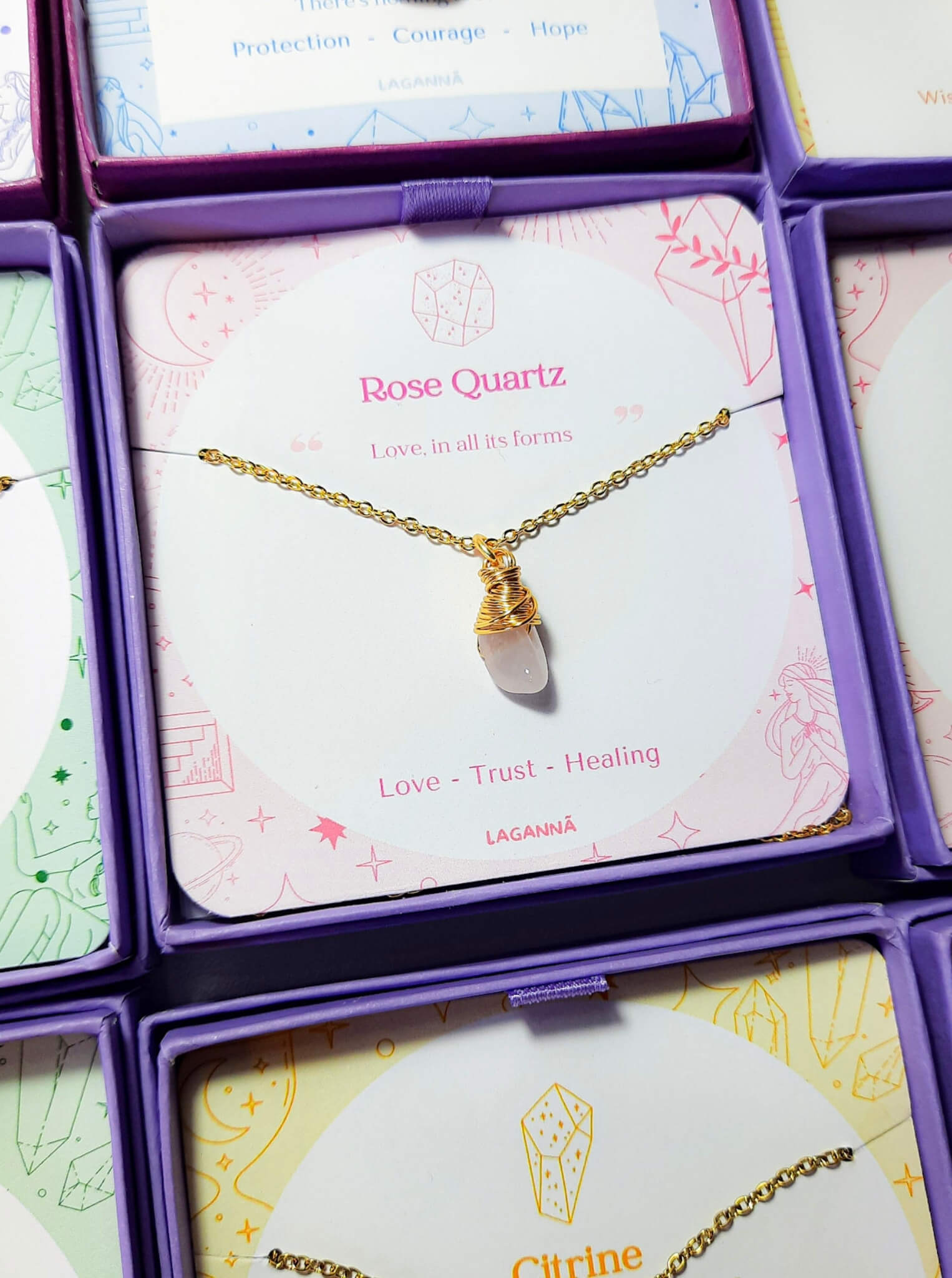 Rose quartz irregular stone necklace jewelry box stacked presentation, handmade Sri Lankan gold wire wrapped healing crystal pendant gift for self-love