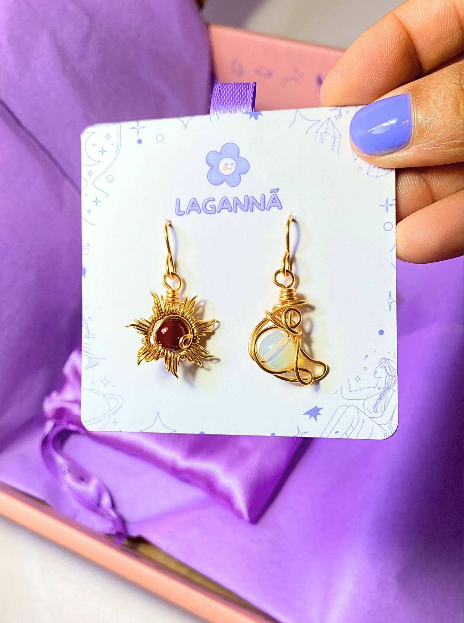 Sun & Moon Dangle Earrings with Carnelian and Opalite healing crystals, handmade gold wire wrapped celestial jewelry from Sri Lanka by Laganna, displayed with jewelry card