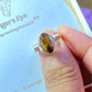 Tiger's eye irregular stone ring jewelry box held in hand showing handmade silver wire wrapped healing crystal gift set, Sri Lankan artisan courage stone ring featuring natural golden brown gemstone perfect as confidence jewelry gift for protection and grounding energy